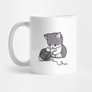 Kitten playing with yarn Mug